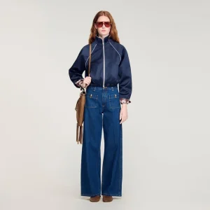 Råa, raka jeans med påsydda fickor